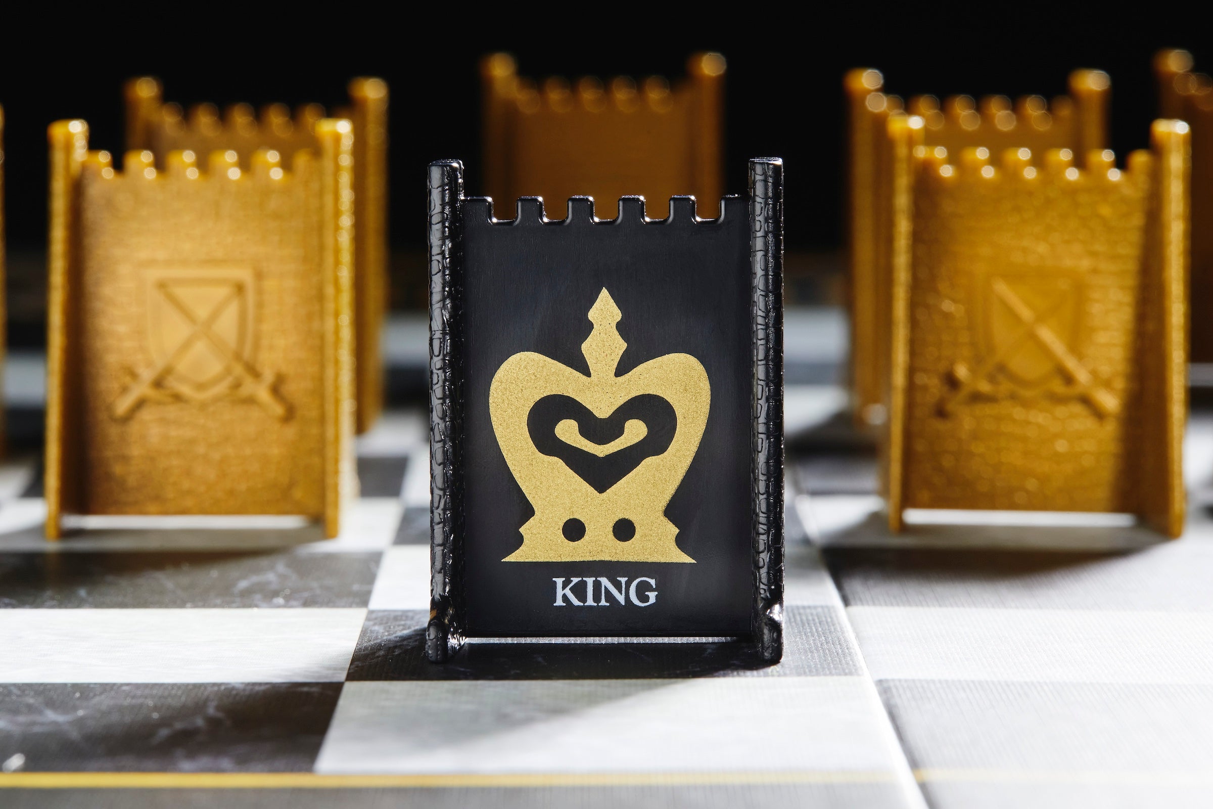 Close up image of the Stealth Chess® black King piece